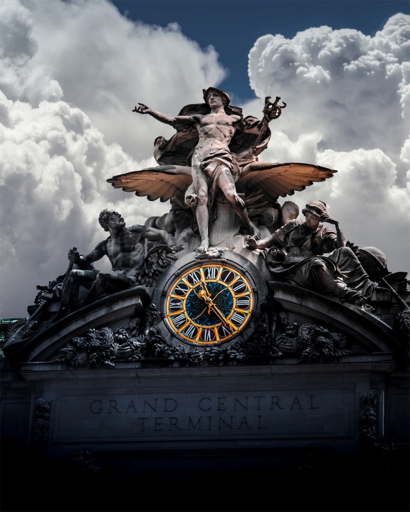 The statue Transportation or alternatively The Glory of Commerce and the Tiffany Clock that adorns the top of Grand Central Terminal, New York City ny nyc
