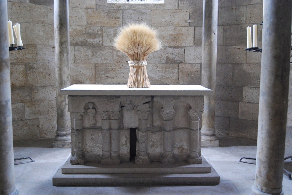 This photograph shows a late 12th-century stone altar made in Castile, Spain. It is at the Cloisters at the Metropolitan Museum of Art in New York City.