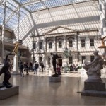 This photograph shows people in the American Wing at the Metropolitan Museum of Art in New York City.