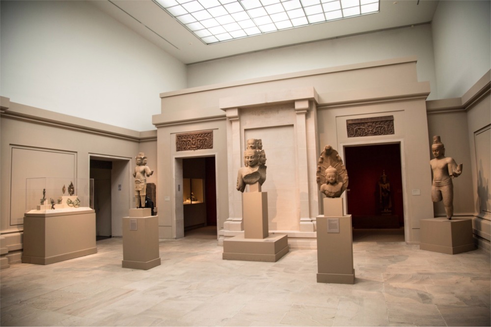Photograph of a statue of Bodhisattva, probably Avalokiteshvara (Guanyin) ca. 550-560 in the Asian Wing at the Metropolitan Museum of Art in New York City.