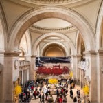 This photograph shows the Great Hall at The Metropolitan Museum of Art in New York City which was designed in the Beaux-Arts style by Richard Morris Hunt and his son, Richard Howland Hunt.