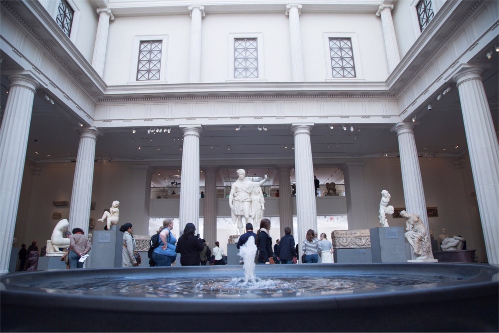 This photograph shows a statue of Dionysos leaning on a female figure housed in the Greek and Roman galleries at the Metropolitan Museum of Art in New York City.