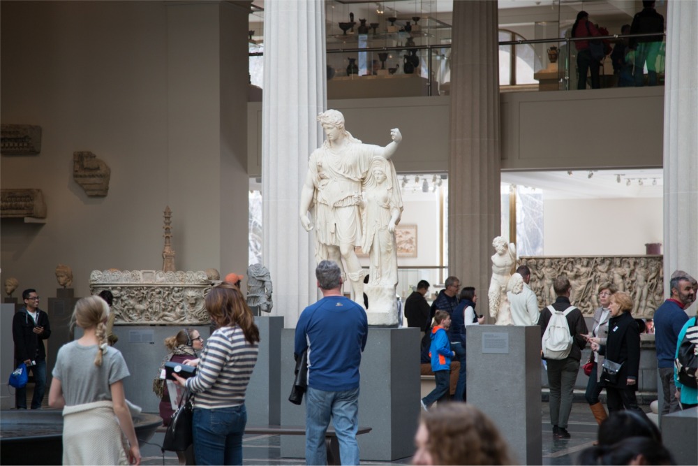 This photograph shows a statue of Dionysos leaning on a female figure housed in the Greek and Roman galleries at the Metropolitan Museum of Art in New York City.