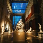 The Carroll and Milton Petrie European Sculpture Court at the Metropolitan Museum of Art in New York City. The statue in the forefront of the image is Ugolino and His Sons.