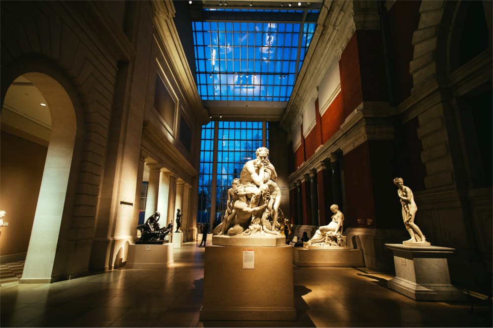 This photograph shows the Carroll and Milton Petrie European Sculpture Court at the Metropolitan Museum of Art in New York City.