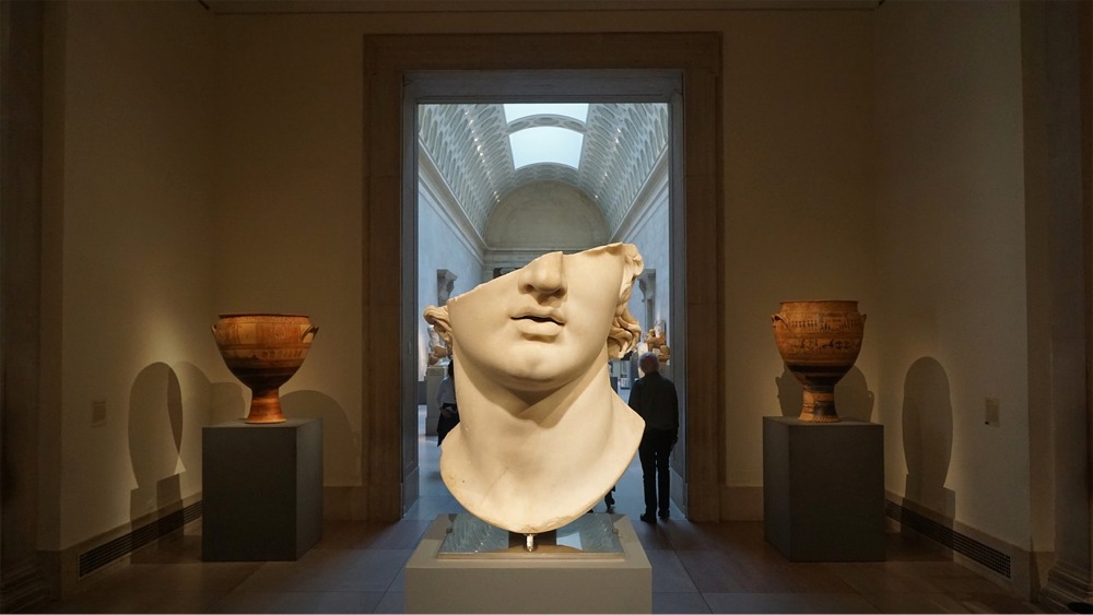 This photograph shows a fragment of a colossal marble head thought to be that of Alexander the Great at the Metropolitan Museum of Art in New York City.