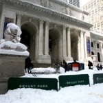 The New York Public Library main branch facade along Fifth Avenue between 40th and 42nd Streets in winter time.