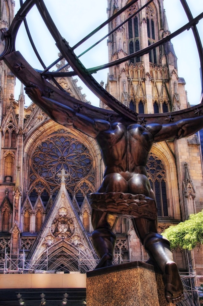 Atlas Statue at the Rockefeller Center and St Patricks Cathedral New York.