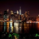 Manhattan Skyline and the Brooklyn Bridge at night, New York.