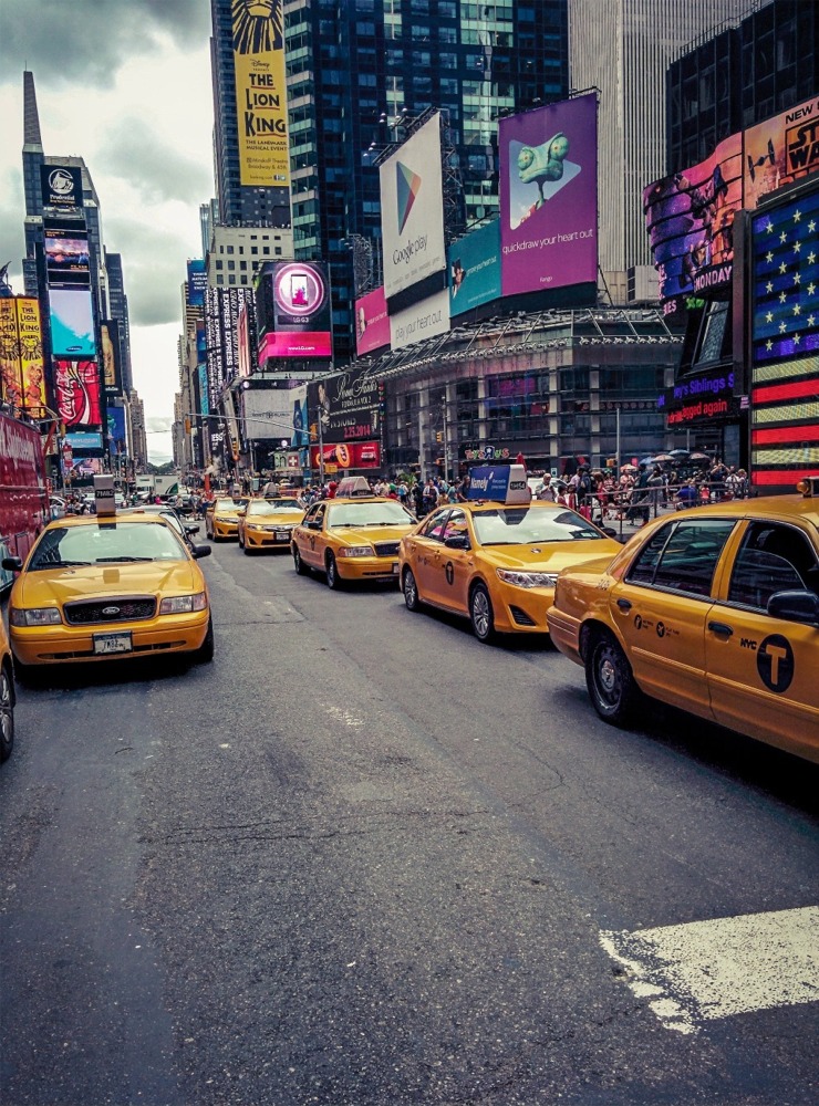 Yellow Cabs in Times Square Manhattan, New York City, NYC.